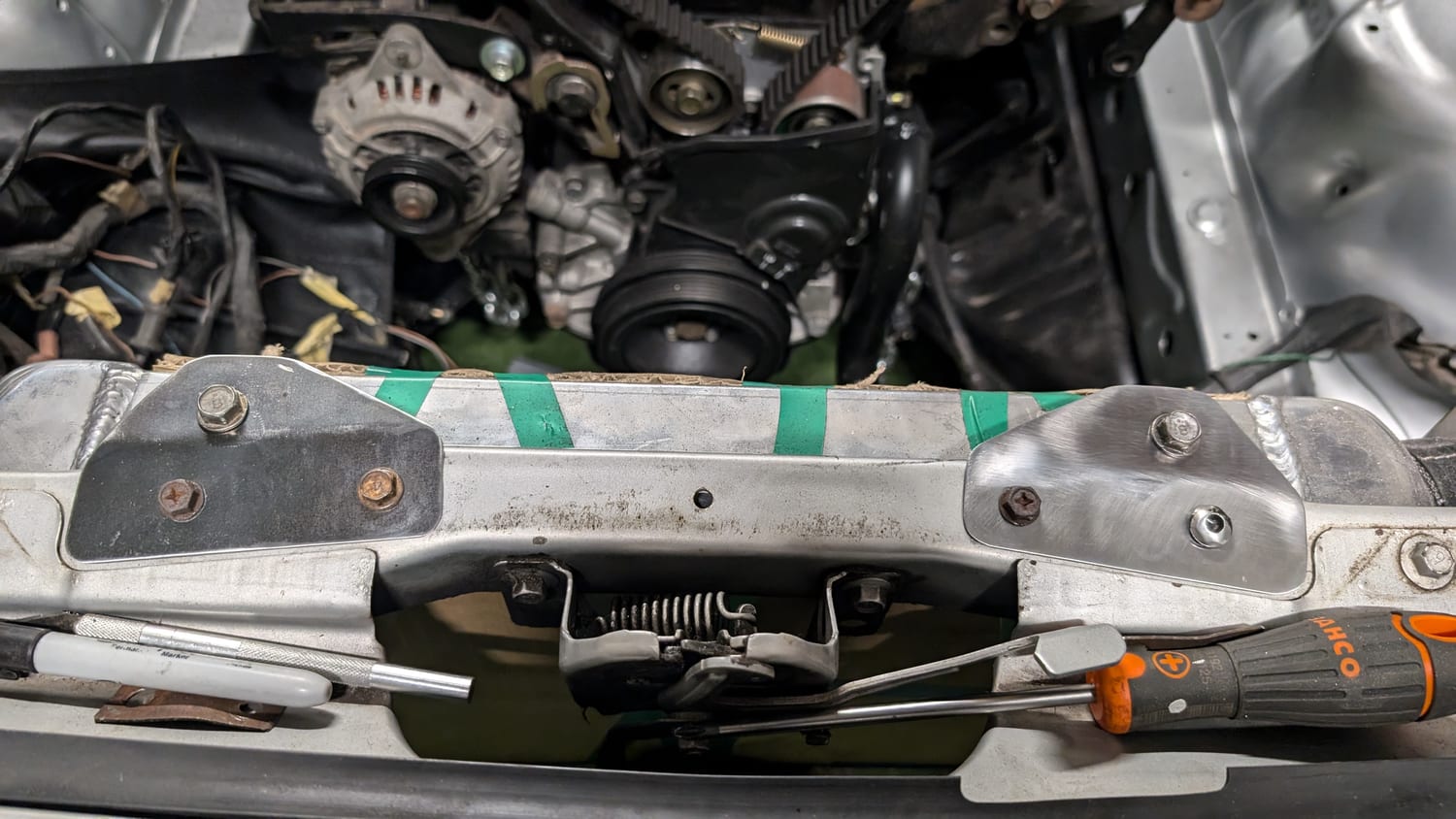 Radiator support and front-of-engine mounts